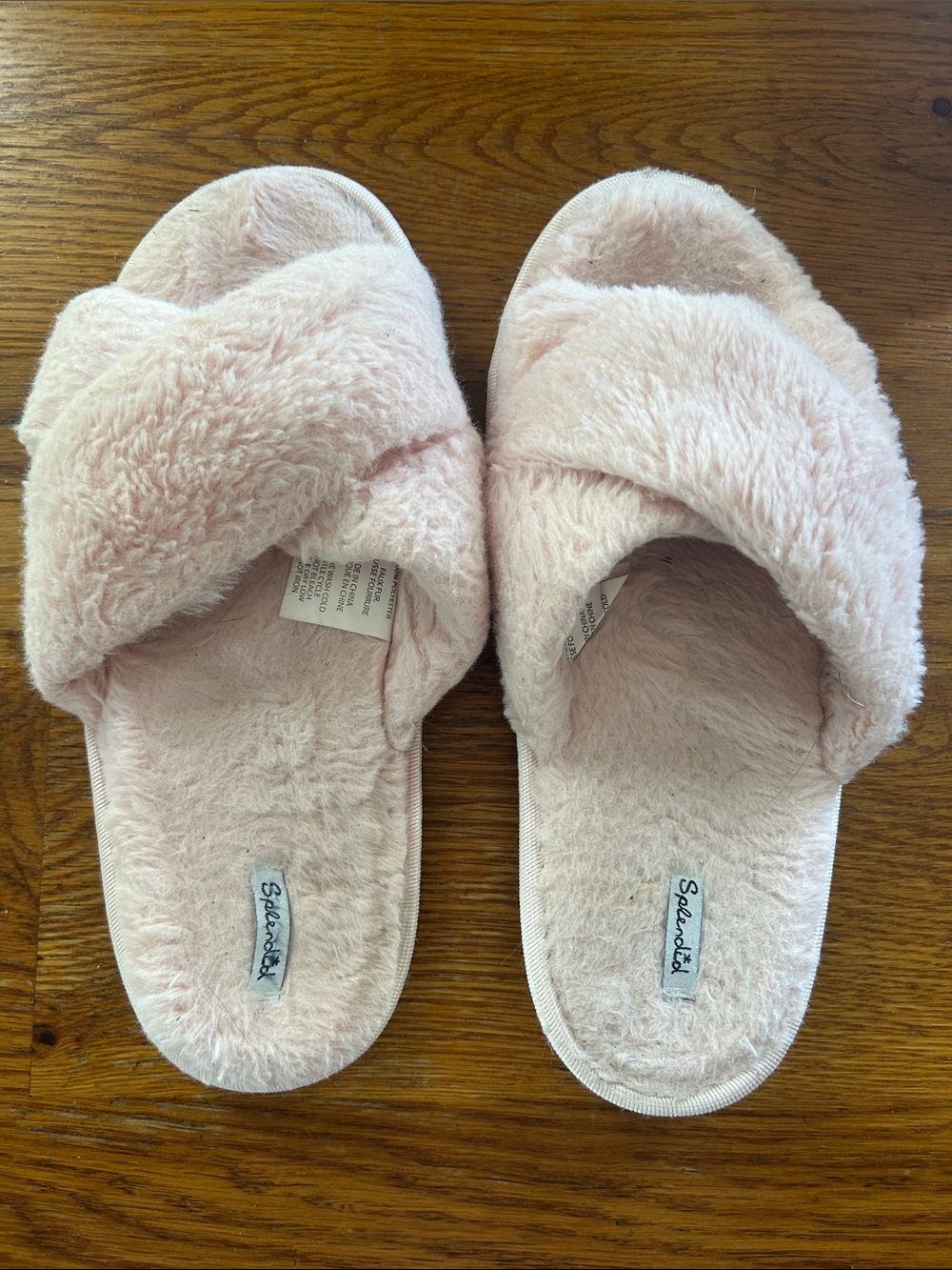 Pink faux fur slide on slippers.